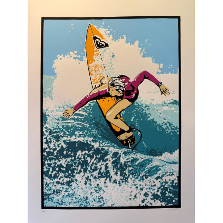 Girl surfing the wave.
