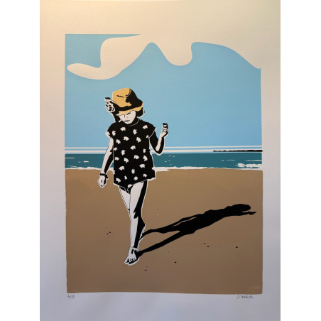 La fillette sur la plage.